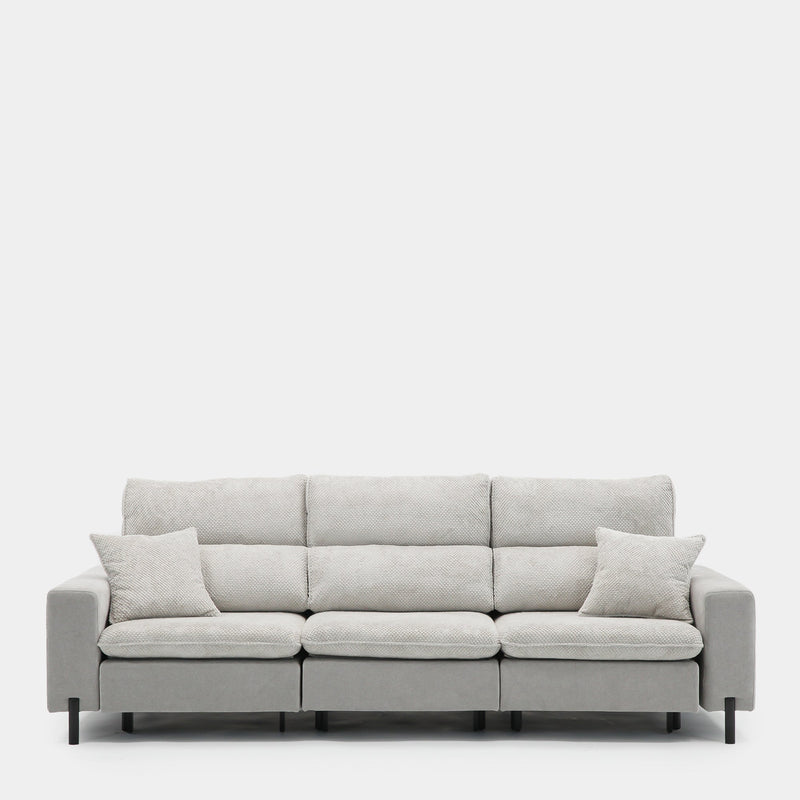 Sofá de tres plazas gris bicolor con texturas suaves