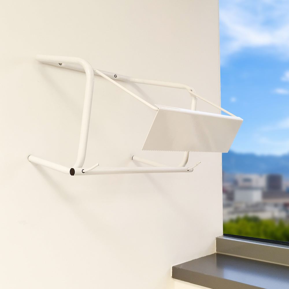 Industrial paper roll holder/dispenser for wall mounting