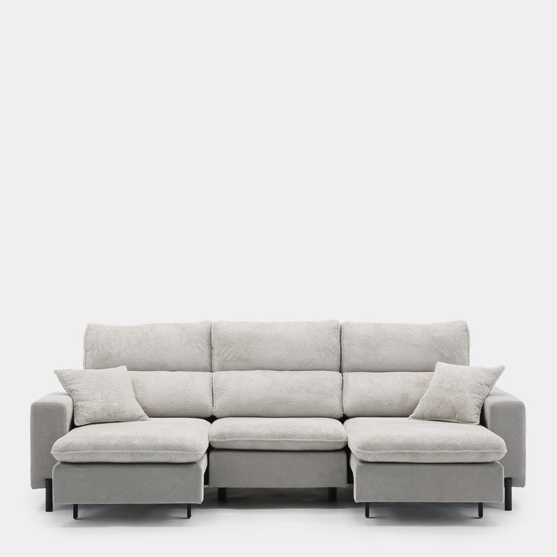 Sofá de tres plazas gris bicolor con texturas suaves