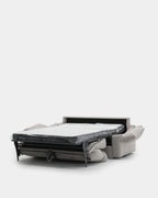 Sofá-cama de 3 lugares bege, resistente a manchas, para uma sala de estar moderna.