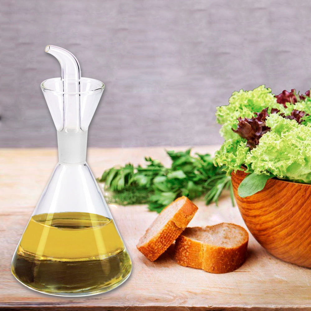Glass oil cruet with anti-drip system, 250 ml capacity.
