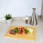 Tabla cortar cocina fabricada en madera de bambú 100% con ranura 32x25,5 cm