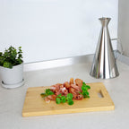 Tabla cortar cocina fabricada en madera de bambú 100% con asa 30x20 cm