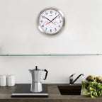Reloj de pared ø 30 cm con higrómetro y termómetro. Frontal en acero