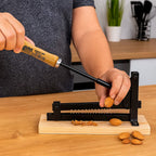 Handmade almond-cracking machine