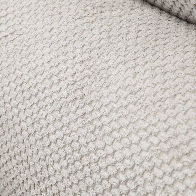 Sofá de tres plazas gris bicolor con texturas suaves