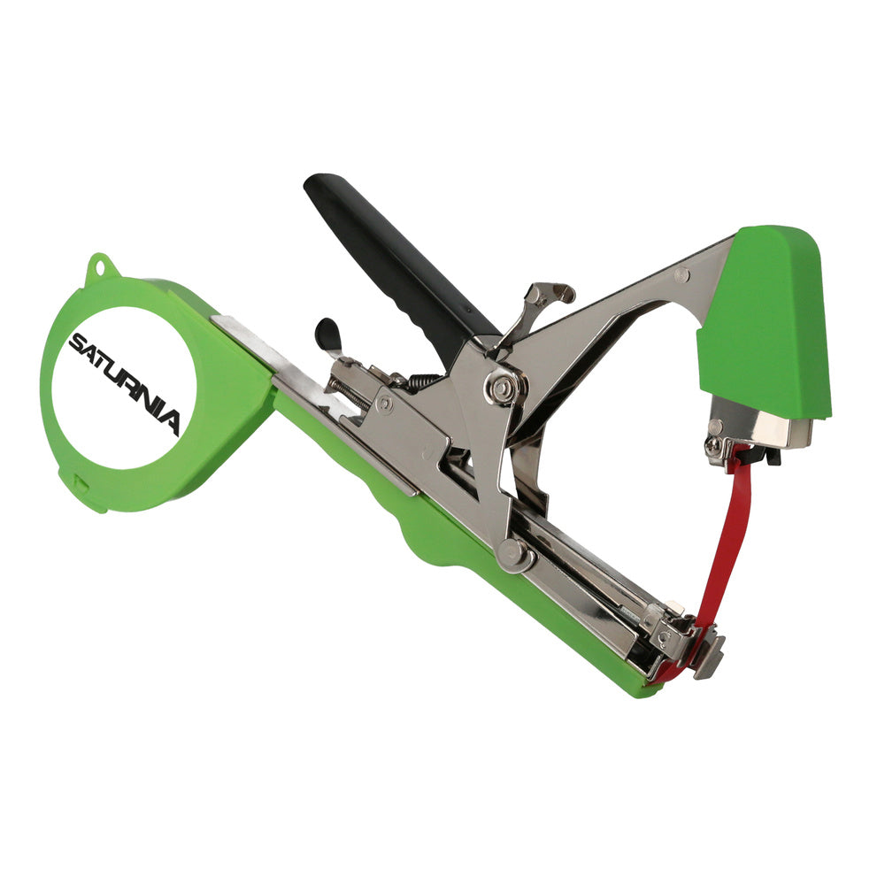 Agricultural tying machine for trellising with tape, staples, blade, and spring
