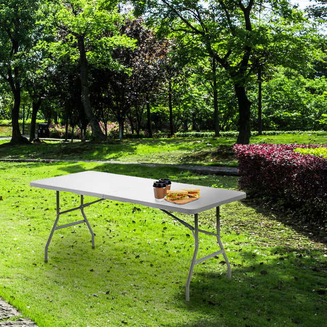 Mesa plegable rectangular HDPE multifuncional, portatil, resistente,multiusos 180x74x74 cm. color blanco