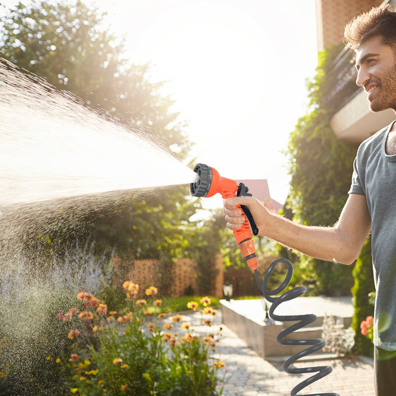 Manguera  extensible espiral autoenroscable para riego jardín 15 metroscon pistola y conectores