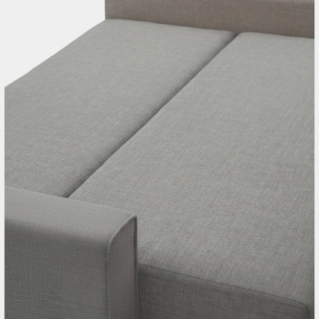 Sofá cama gris con apertura libro y almacenamiento