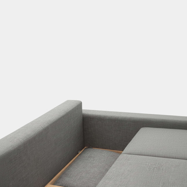 Sofá cama gris con apertura libro y almacenamiento