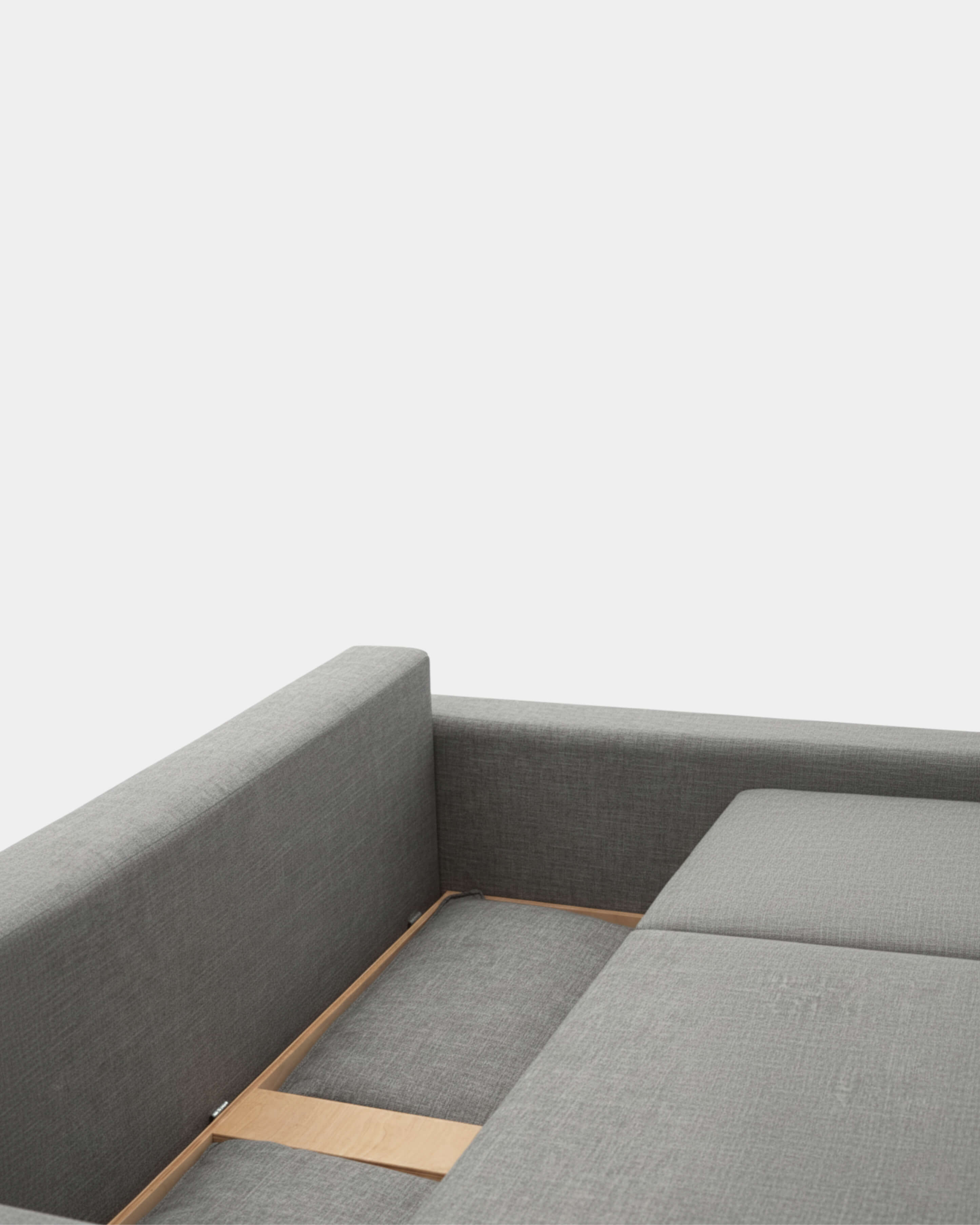 Sofá cama gris con apertura libro y almacenamiento