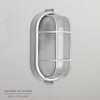 Plafonier industrial oval branco.