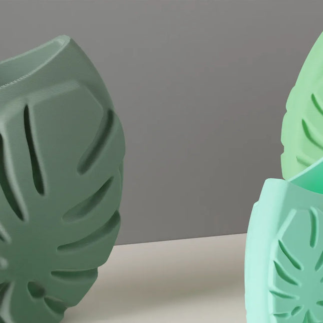 Jarrón decorativo con hojas tropicales en relieveJARRÓNHome & Garden > Decor > Vases