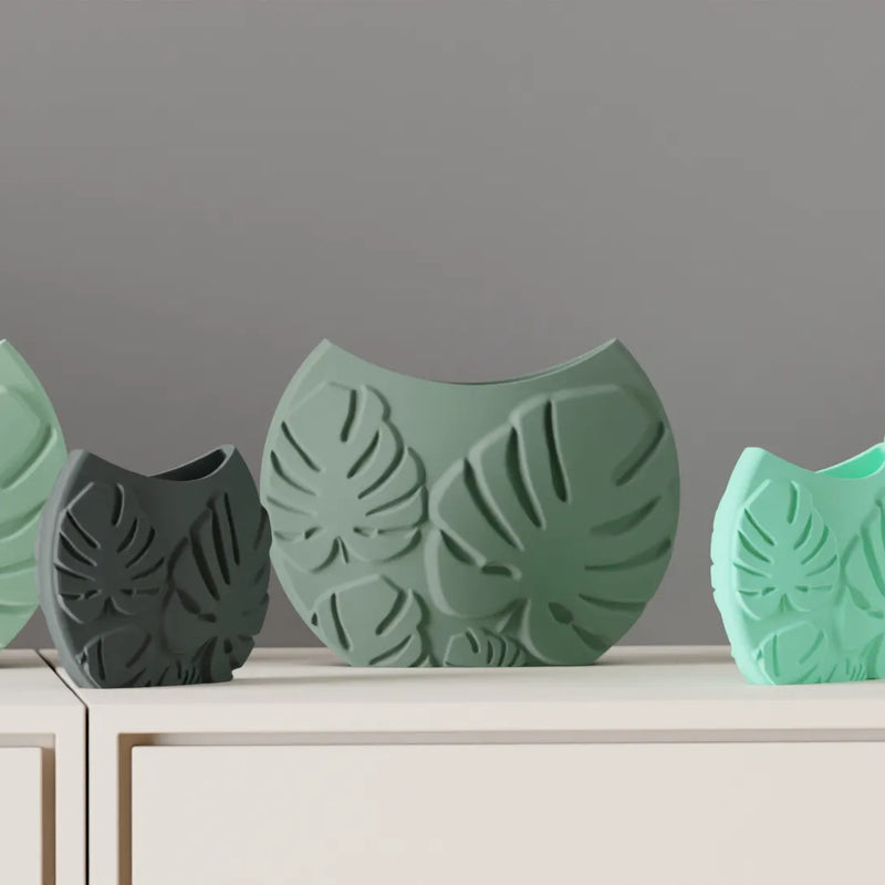 Jarrón decorativo con hojas tropicales en relieveJARRÓNHome & Garden > Decor > Vases