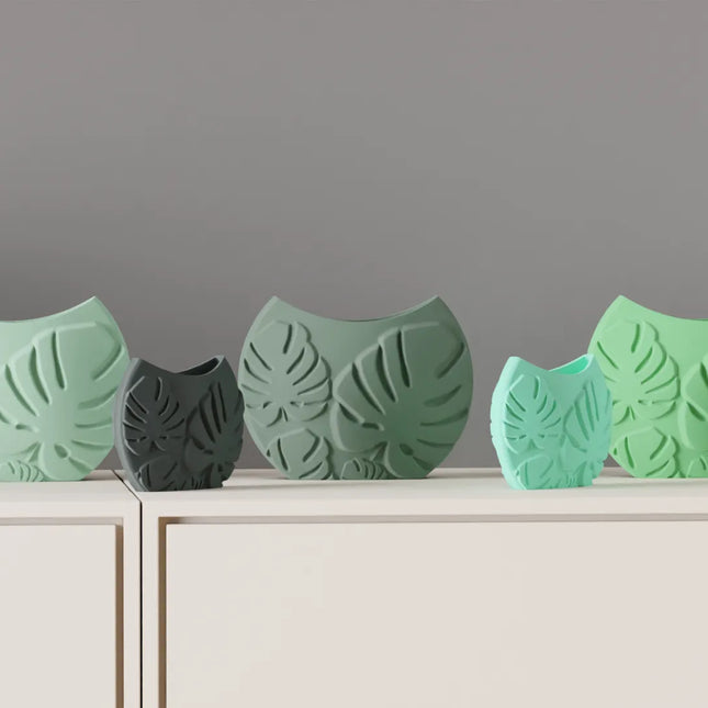 Jarrón decorativo con hojas tropicales en relieveJARRÓNHome & Garden > Decor > Vases