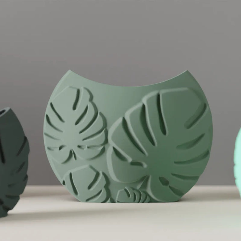 Jarrón decorativo con hojas tropicales en relieveJARRÓNHome & Garden > Decor > Vases