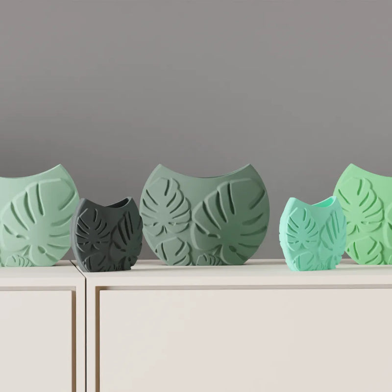 Jarrón decorativo con hojas tropicales en relieveJARRÓNHome & Garden > Decor > Vases