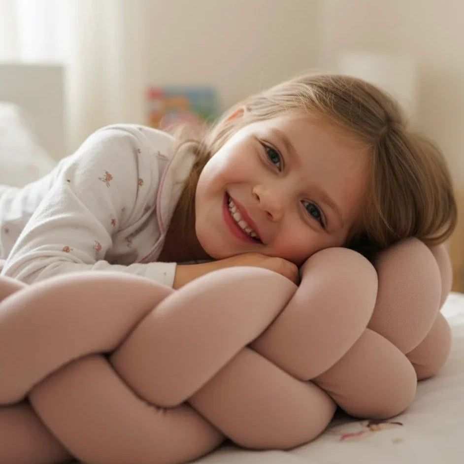Trenza protector de cuna de 210cm en algodón rosa para bebés