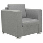 Sillón de tela gris claro