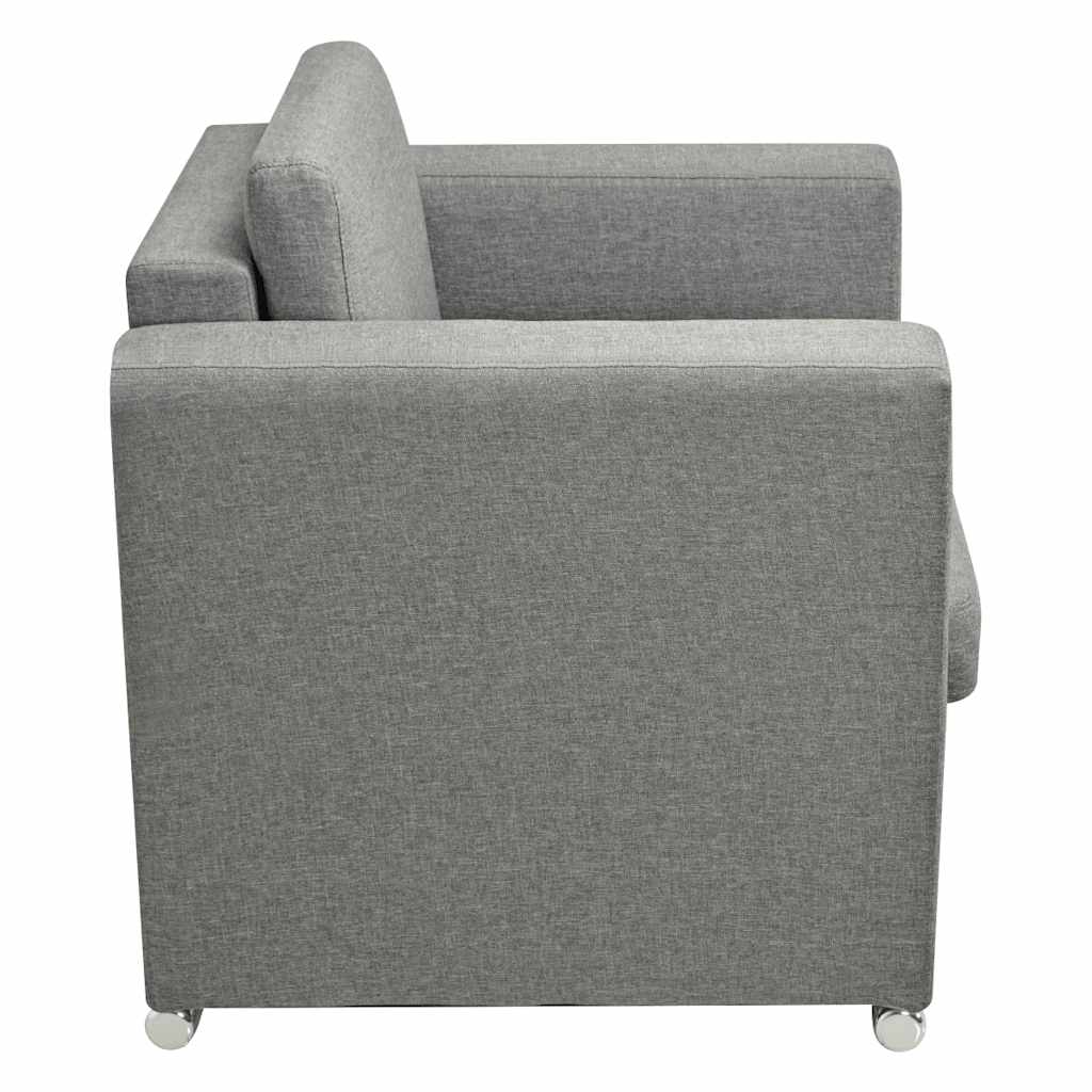 Sillón de tela gris claro