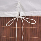 Cesto de la ropa de bambú ovalado marrón