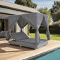 Grey synthetic rattan sun lounger with curtains
