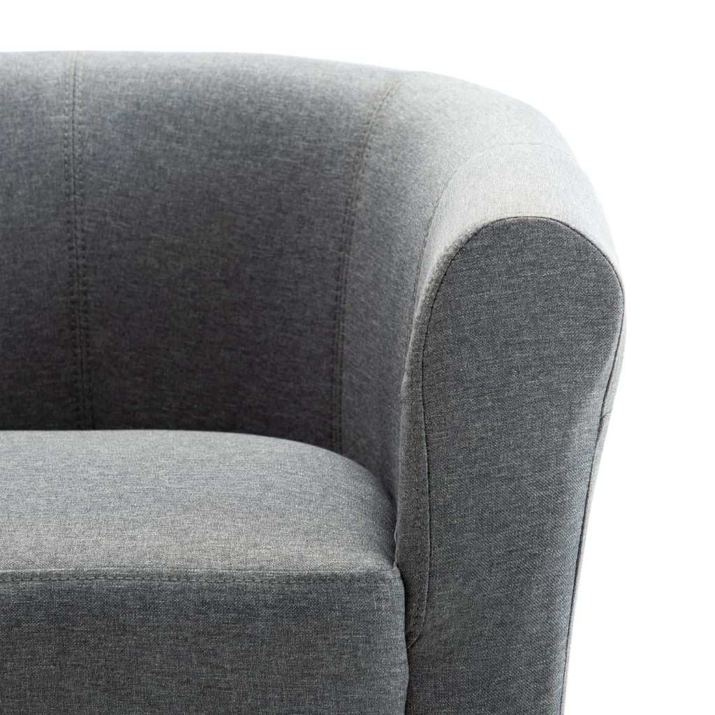 Sillón de tela gris claro