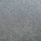 Sillón de tela gris claro