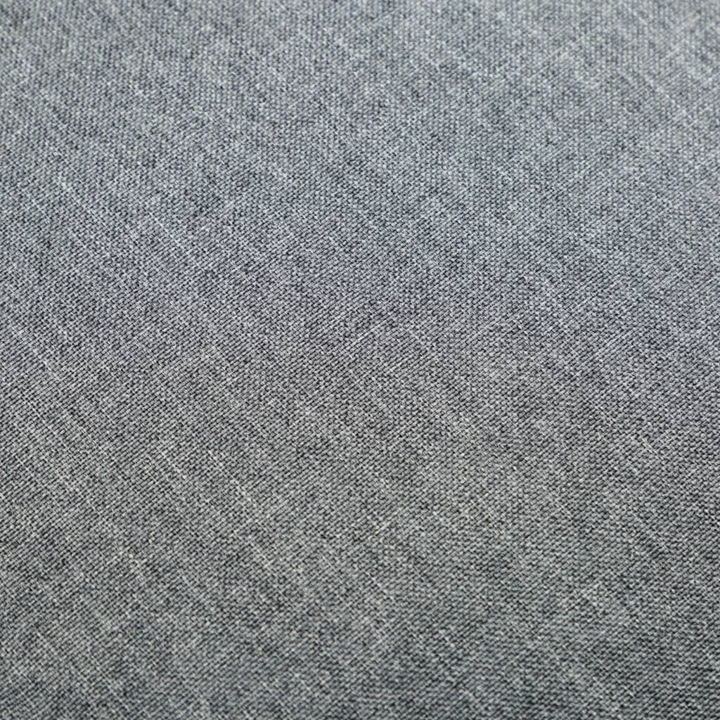 Sillón de tela gris claro