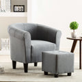 Sillón de tela gris claro