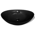 Lavabo Oval de cerámica negra de lujo con desagüe, 59 x 38,5 cm