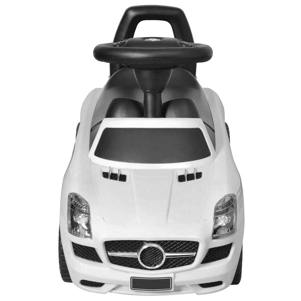 Coche de niños accionado con el pie blanco