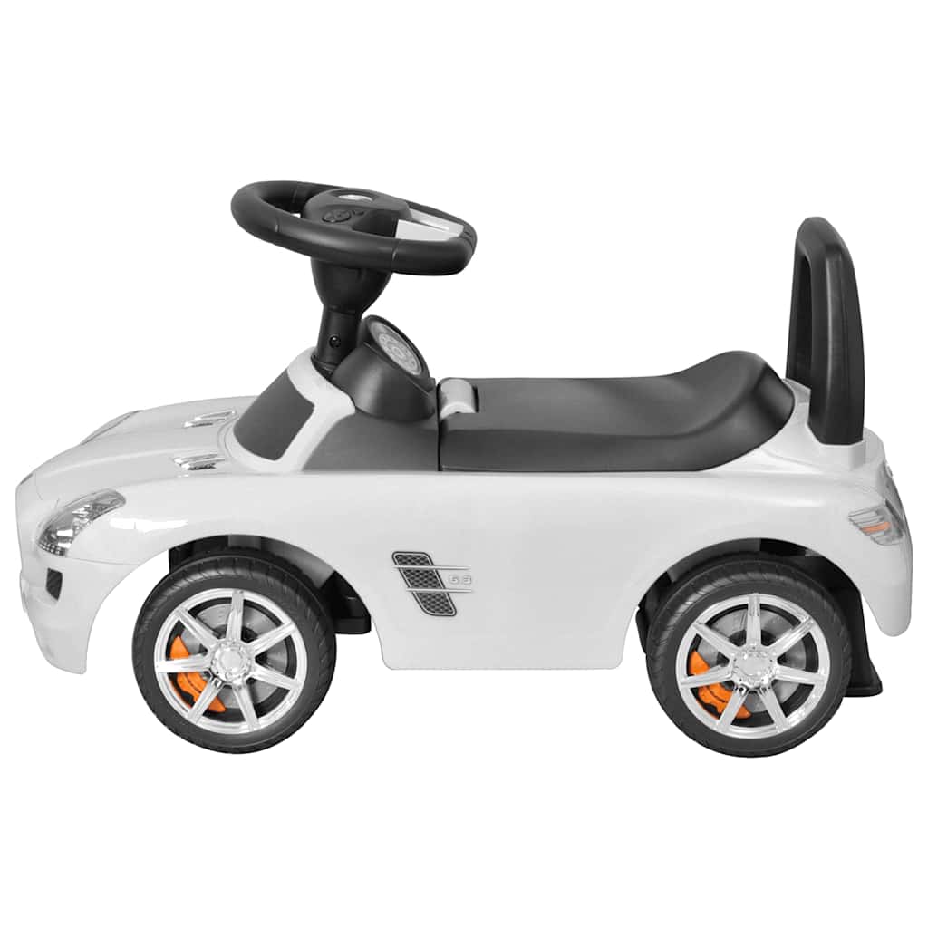 Coche de niños accionado con el pie blanco