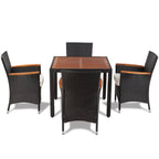 Set comedor de jardín 5 piezas y cojines ratán sintético negro