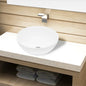 White ceramic round bathroom sink