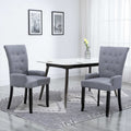 Silla de comedor con reposabrazos de tela gris claro