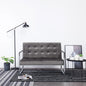2-seater sofa with chrome armrest and dark gray velvet