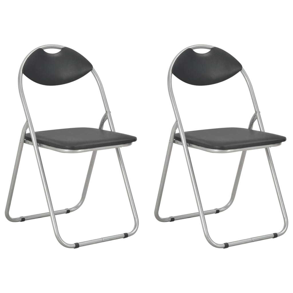 2 white faux leather folding dining chairs