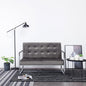 2-seater sofa with chrome armrest and dark gray velvet