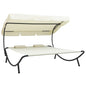 Outdoor lounge chair with canopy and cream-white cushions