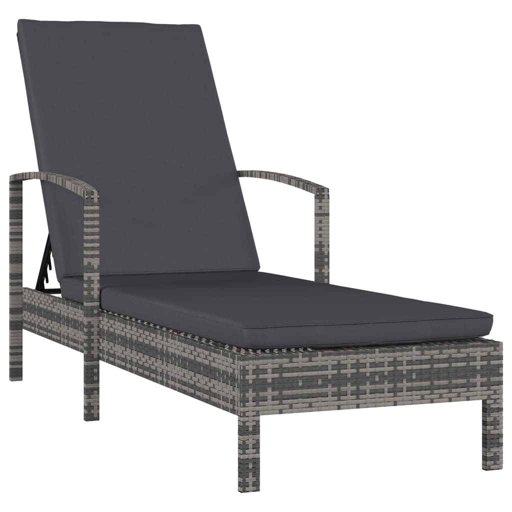 Black synthetic rattan sun lounger with cushions