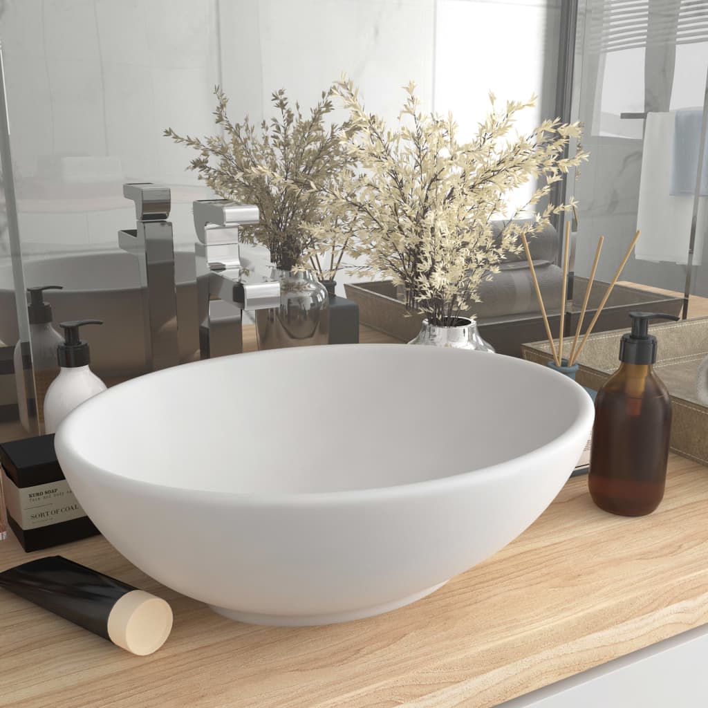 Luxury oval matt light blue ceramic washbasin 40x33 cm
