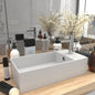 Light blue ceramic sink with overflow