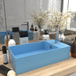 Light blue ceramic sink with overflow