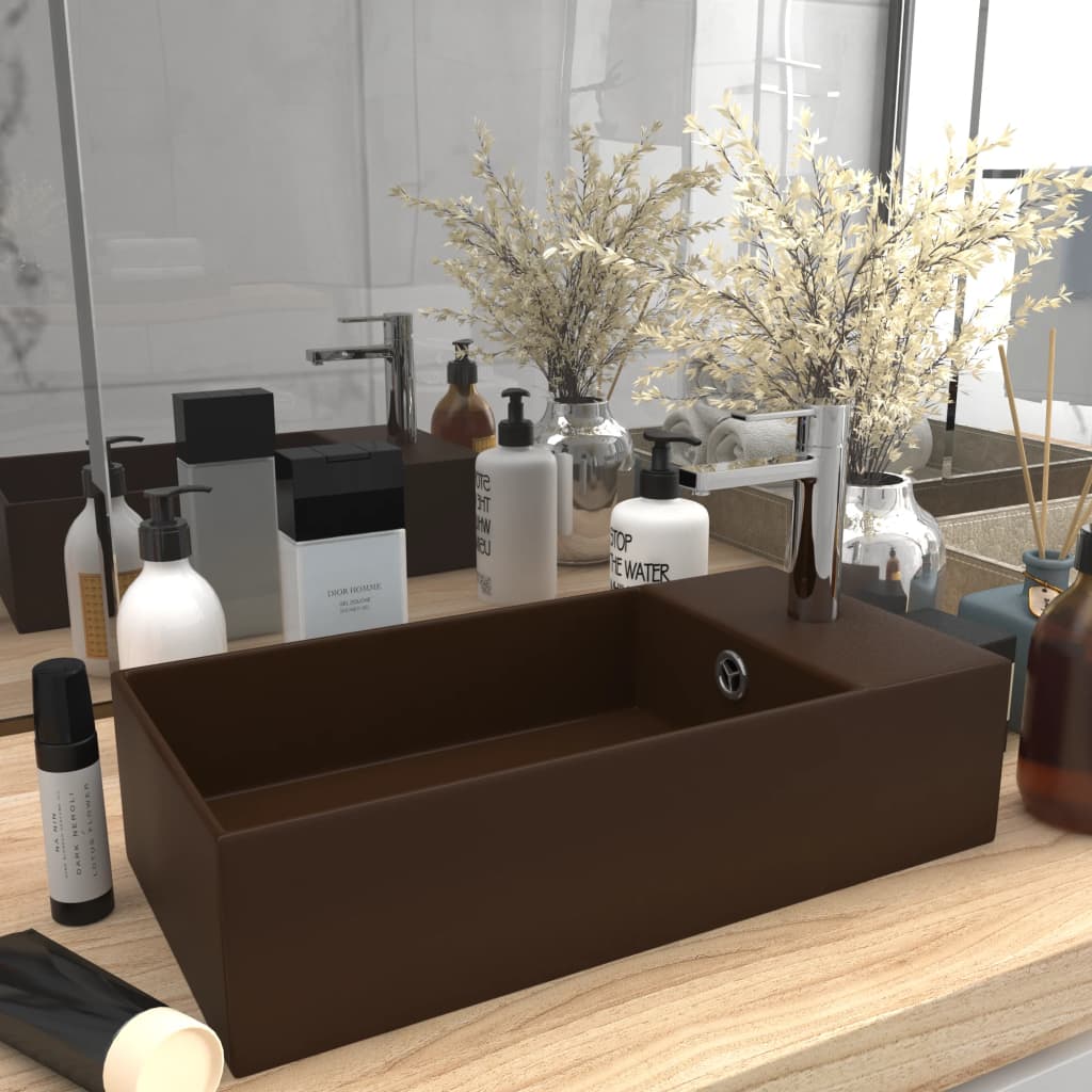 Light blue ceramic sink with overflow