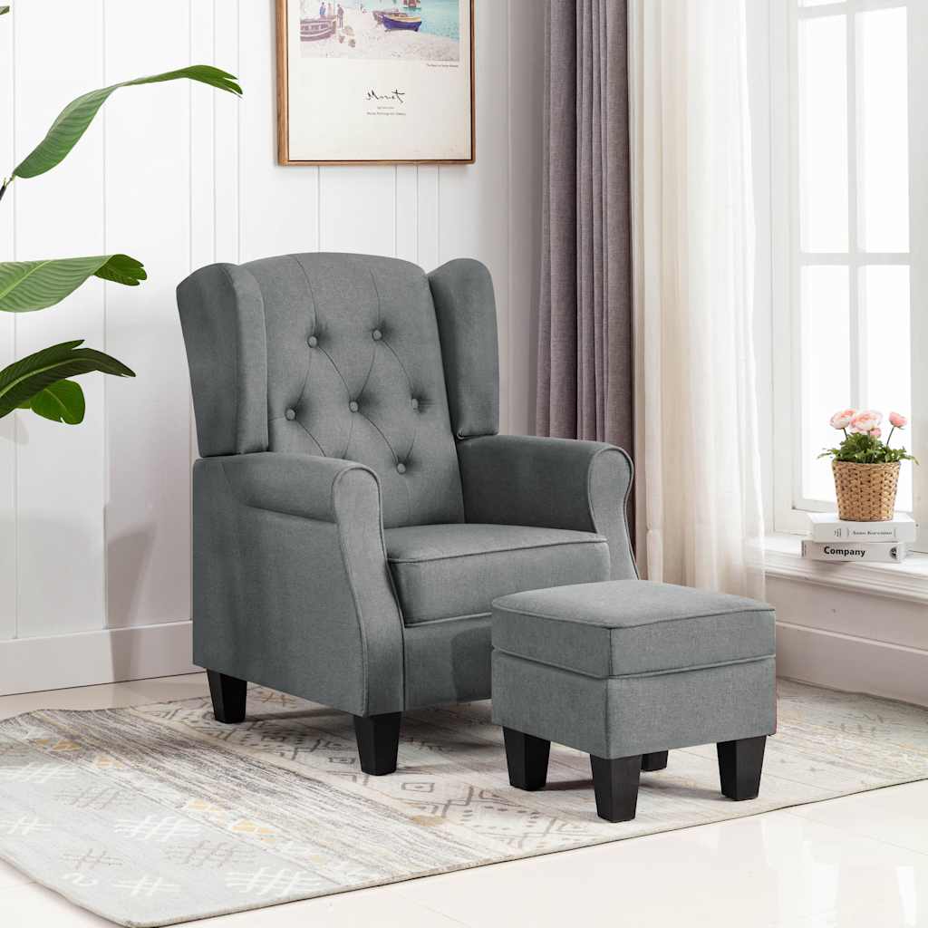 Sillón con reposapiés de tela crema