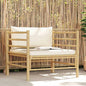 Bamboo garden sofa with dark gray cushions