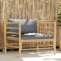 Bamboo garden sofa with dark gray cushions