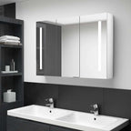 Armario de baño con espejo y LED gris hormigón 50x13x70 cm